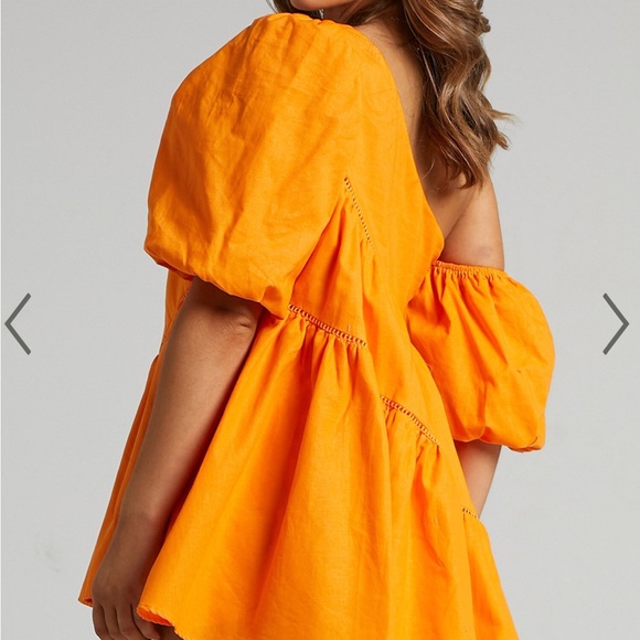 SHOWPO HARLEEN MINI DRESS - ASYMMETRICAL TRIM PUFF SLEEVE DRESS IN ORANGE - Picture 2 of 3